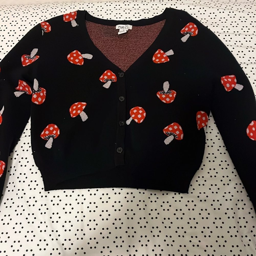 Used once mushroom cardigan size medium.